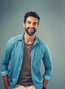 Portrait,,Happy,And,Man,In,Studio,For,Smile,,Fashion,And Suks Minhas Male Fertility Expert